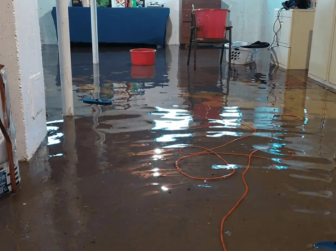 Basement with boiler, cabinets and washing machine completely flooded in Evansville, IN